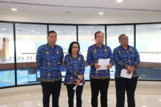 Pejabat BMKG memberikan peringatan dini / Foto: BMKG