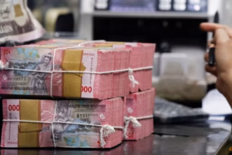 Uang rupiah / Foto: CNA